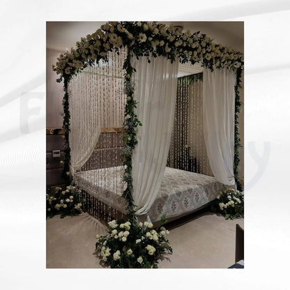 Premium Package Features A Grand Four-Poster Floral Canopy.