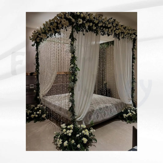 Premium Package Features A Grand Four-Poster Floral Canopy.