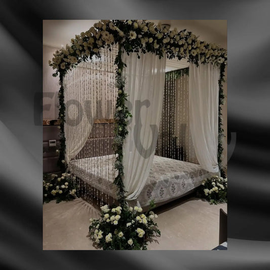 Premium Package Features A Grand Four-Poster Floral Canopy.